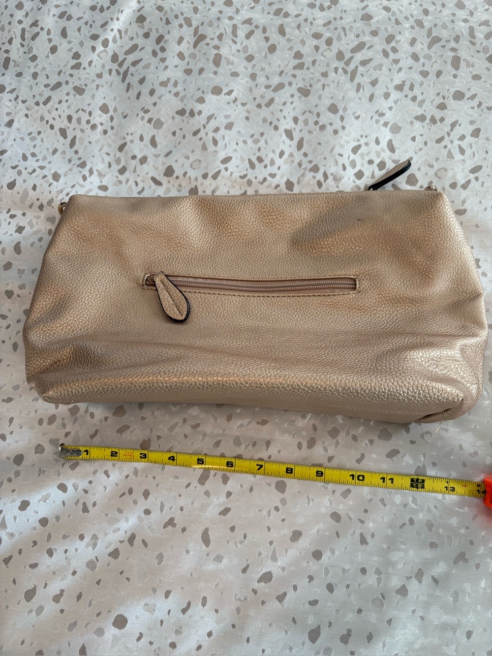 Metallic Champagne Leather Clutch. No strap.